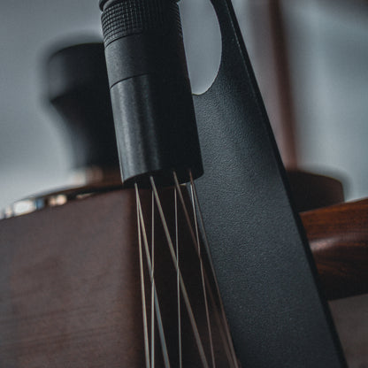 Black magnetic wdt espresso tool on its stand