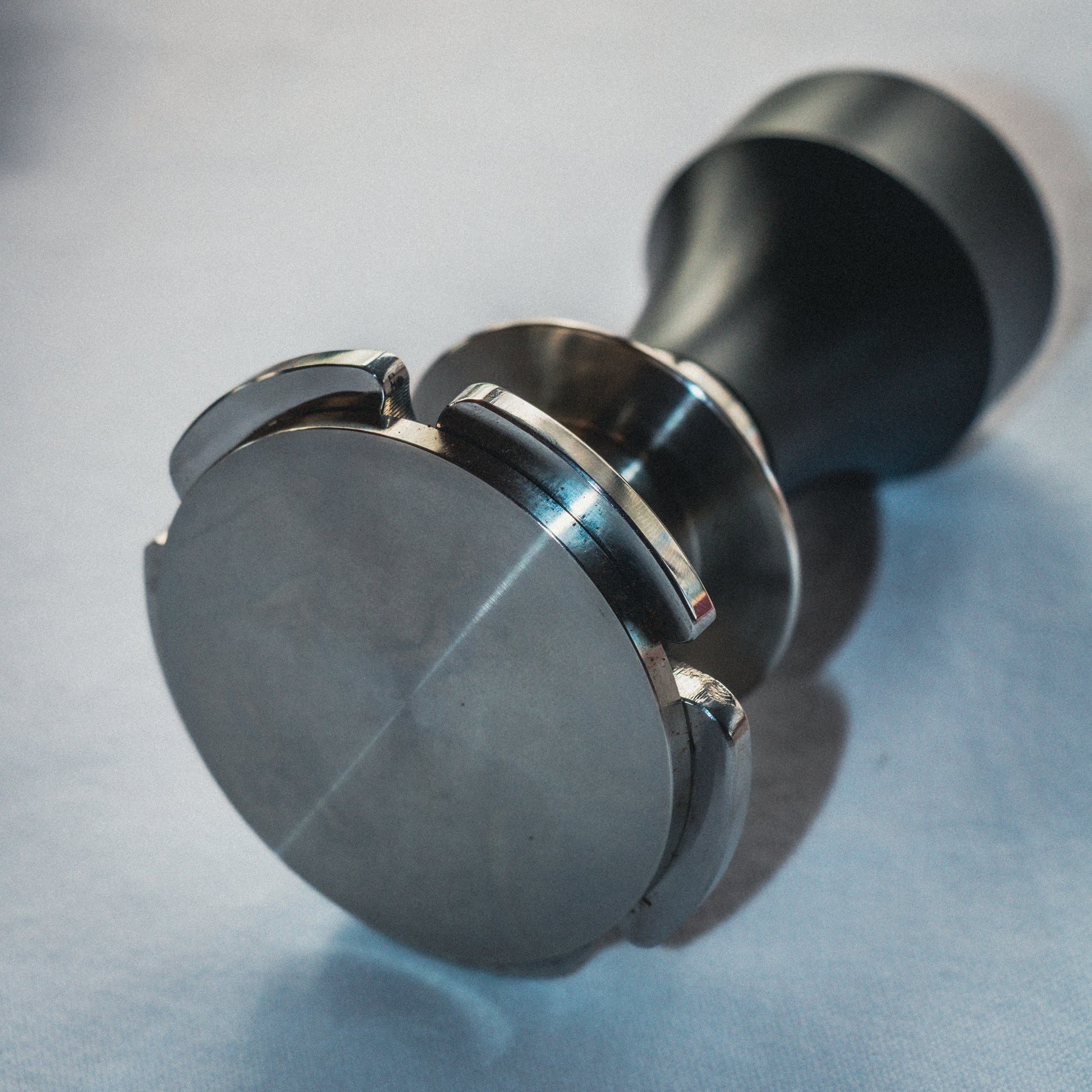 Espresso tamper laying down