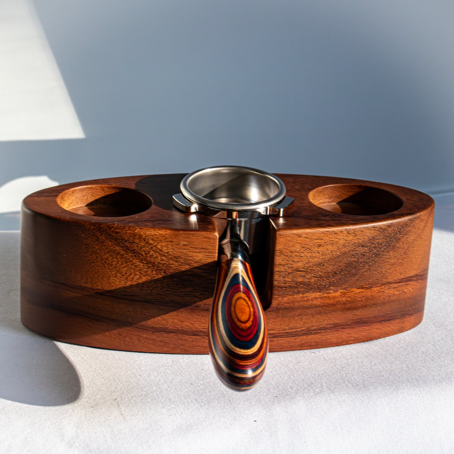 Wooden espresso tamping station with portafilter