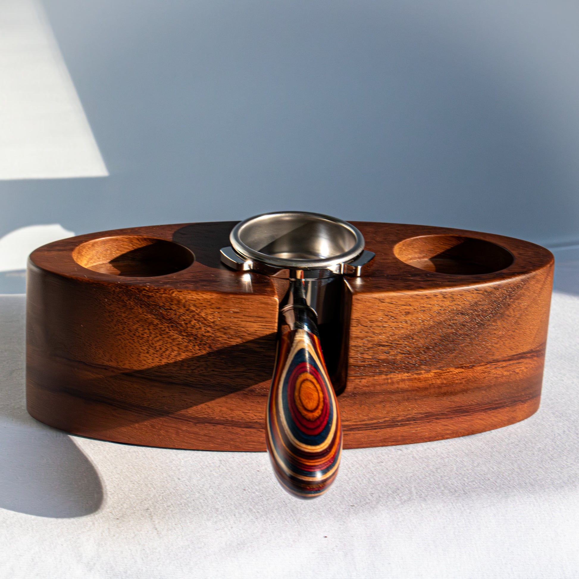 Wooden espresso tamping station with portafilter