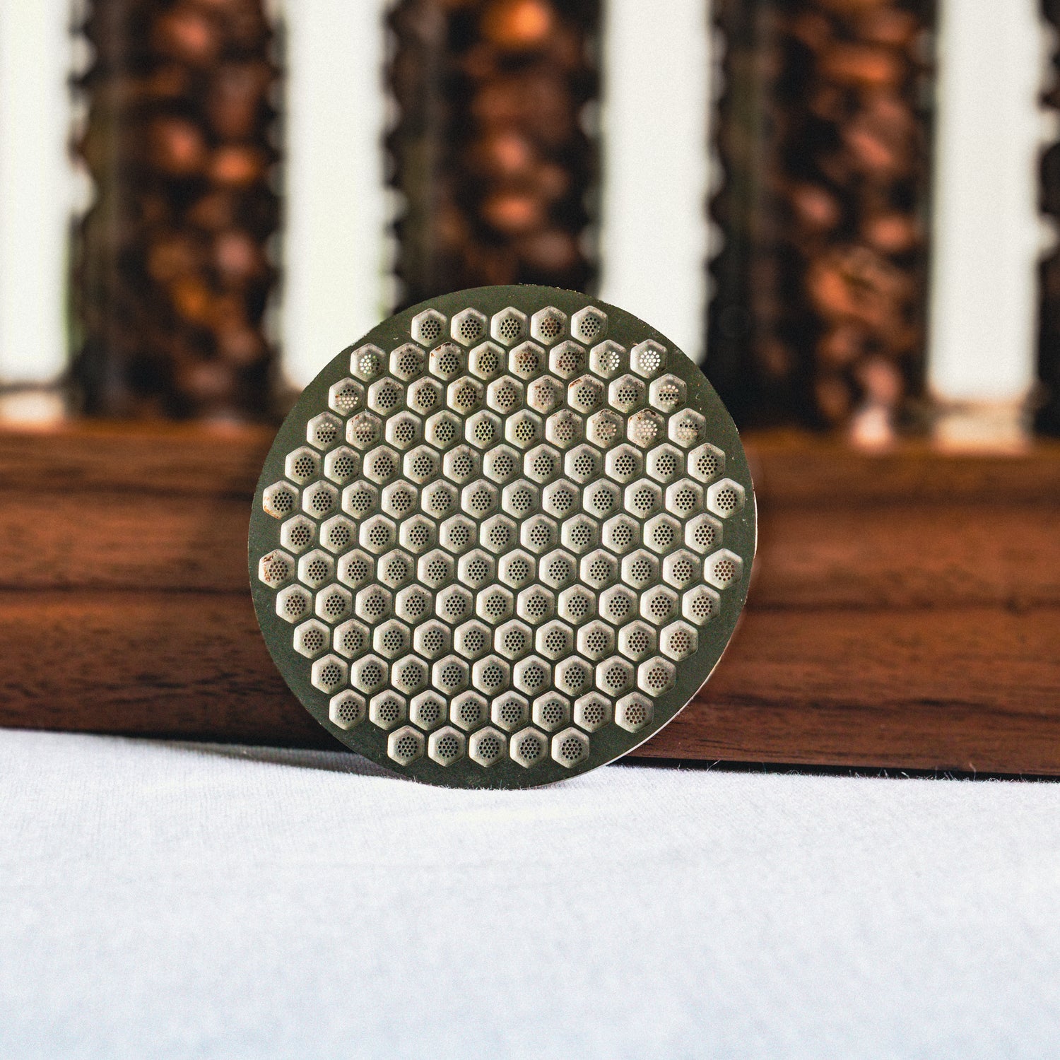 Honeycomb puck screen in white surface