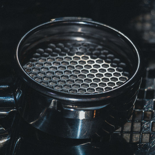 Metallic honeycomb puck screen close up photo