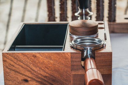 Wooden espresso tamping station from front view